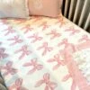 Petal Pink Bows Bamboo Crib Sheet 2 Petal Pink Bows Bamboo Crib Sheet -Liz and Roo petal pink bows crib sheet bamboo 500040